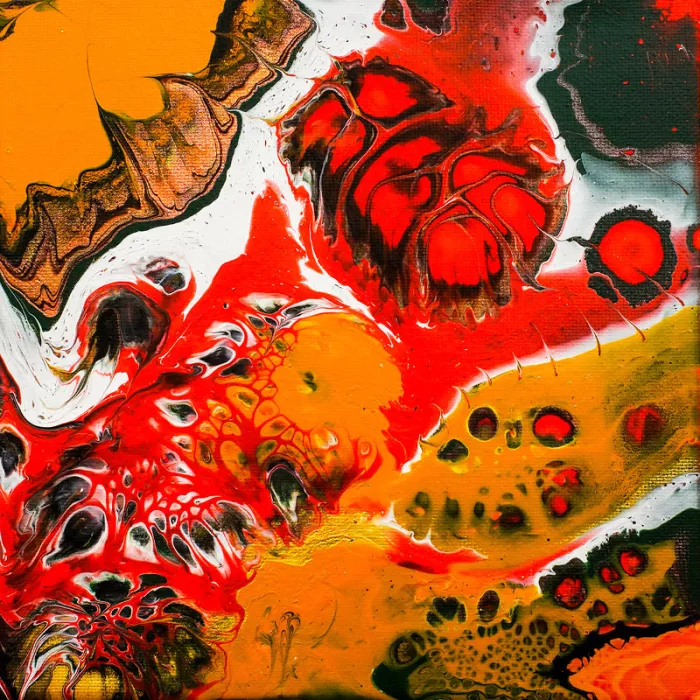Abstract schilderij in oranje, rood, zwart en wit met ronde rode cellen